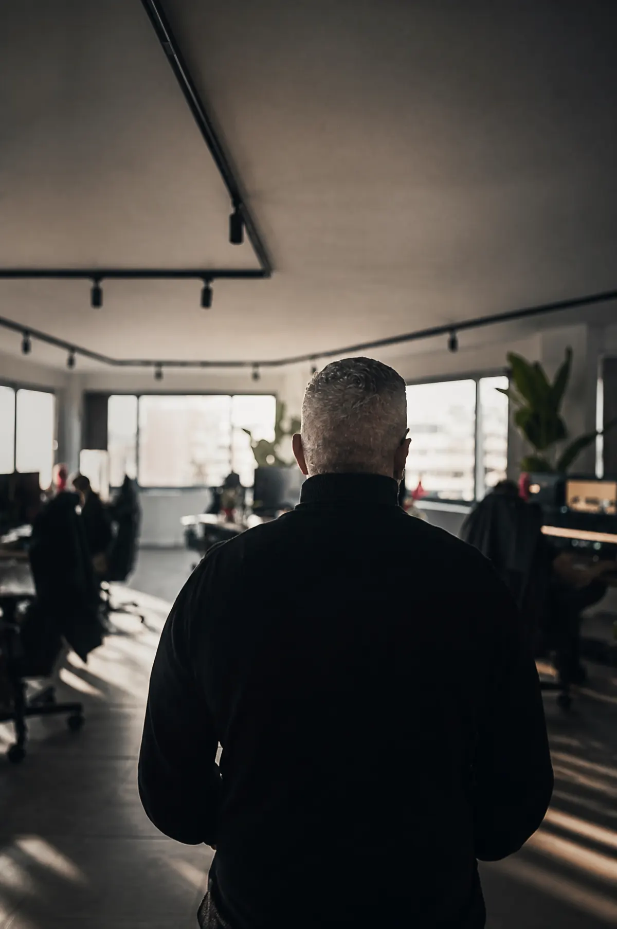 Walking into the morning light of the Designco open workspace