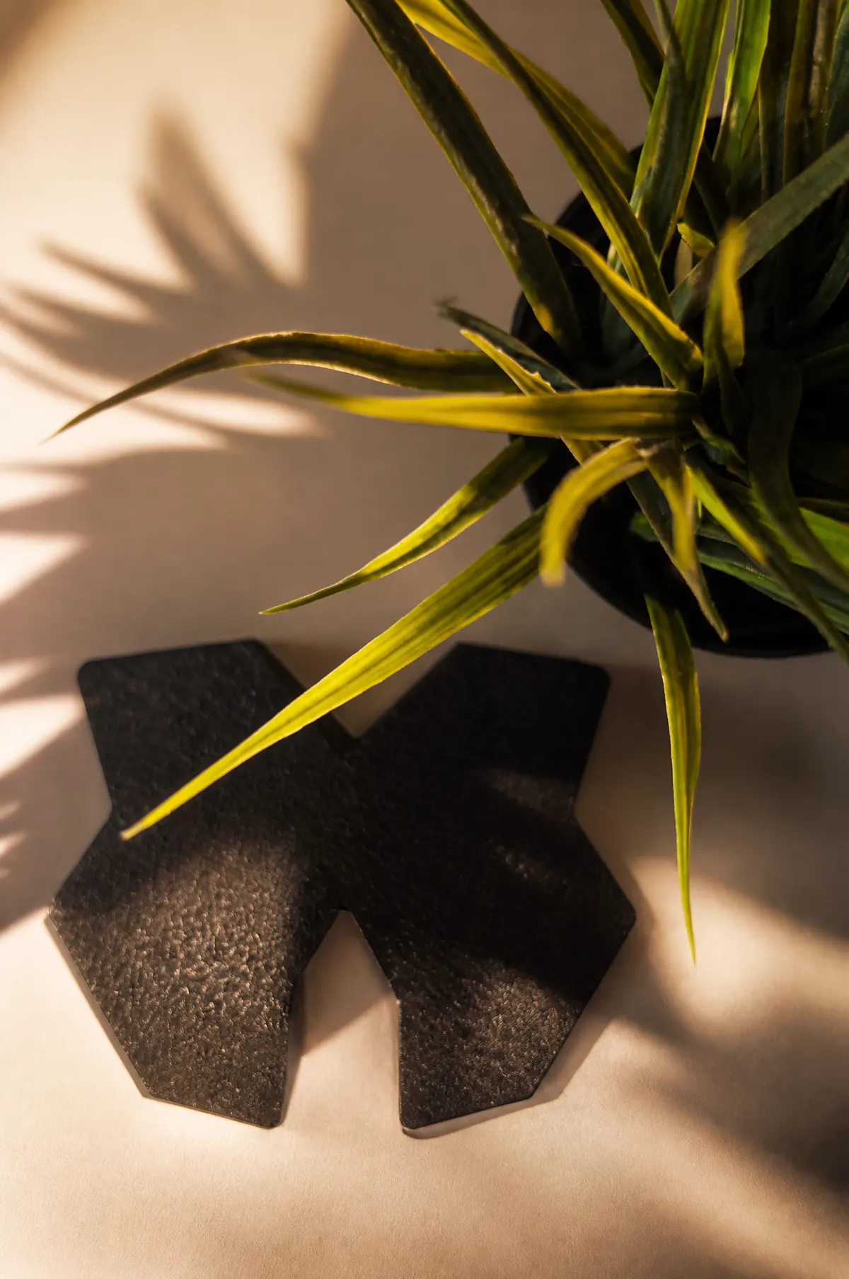 The Designco mark as a cut object in afternoon light