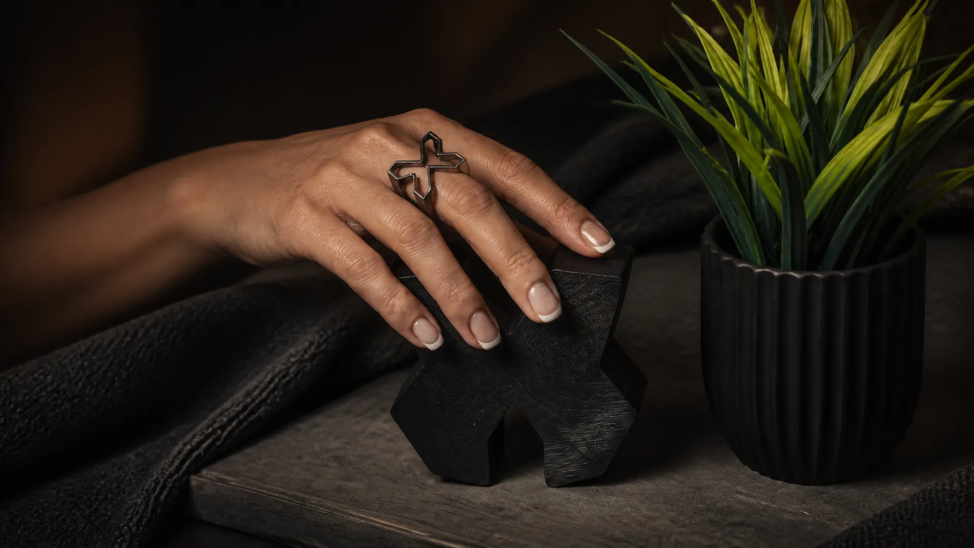 A Designco ring meets the carved mark, matte black on black
